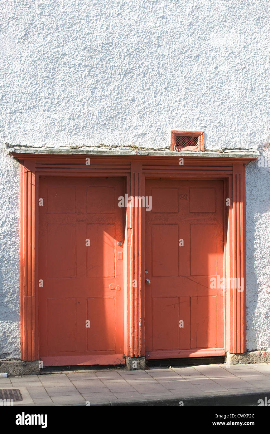 Terrace House with Terracotta colored Doors and Shutters Stock Photo