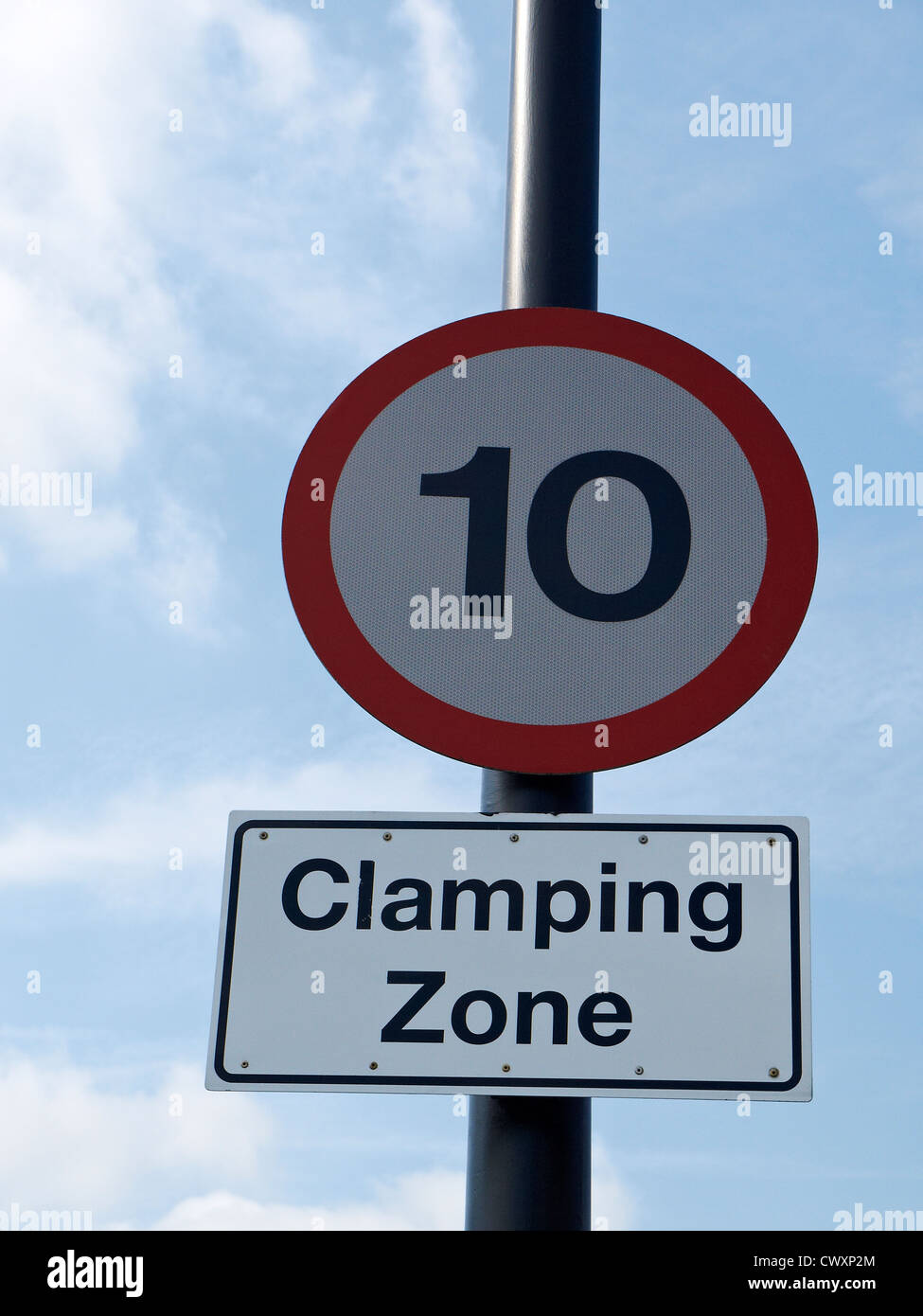 Clamping zone and 10 miles speed limit traffic warning signs UK Stock