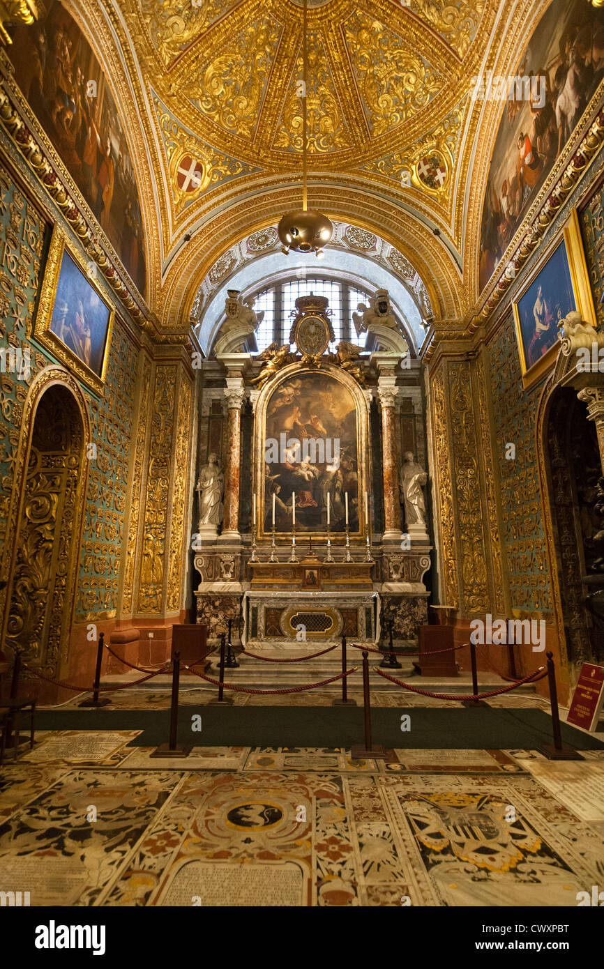 Vertical interior shot of St John's Co-Cathedral in St John's Square, Valletta, Island of Malta, Mediterranean Sea Stock Photo