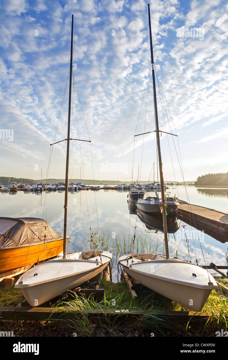 Two small sailboats on the coast of Saimaa lake in Imatra town, Finland Stock Photo