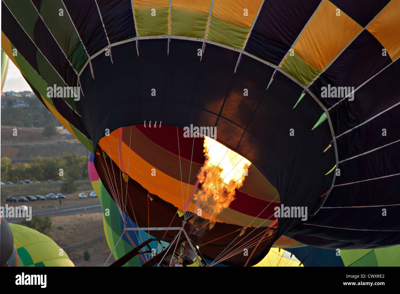 Filling a balloon with hot air. Eye candy is the only way to describe