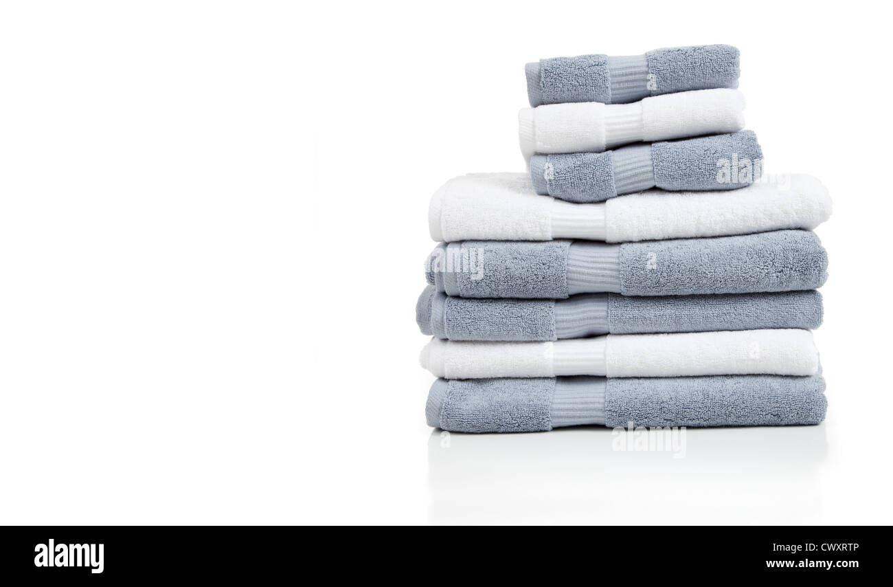 Gray and white towels on a white background with copy space Stock Photo