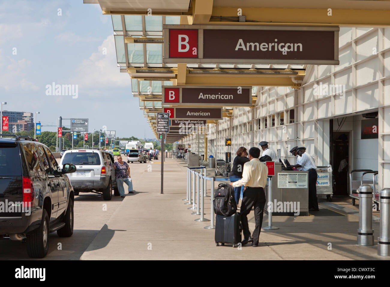 Curb-side baggage check-in area - Ronald Reagan National Airport (DCA)  - Washington, DC USA Stock Photo