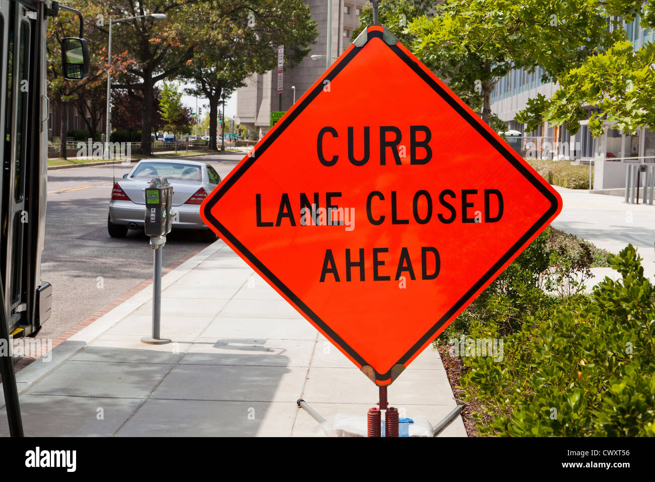 Curb Lane Closed Ahead sign Stock Photo