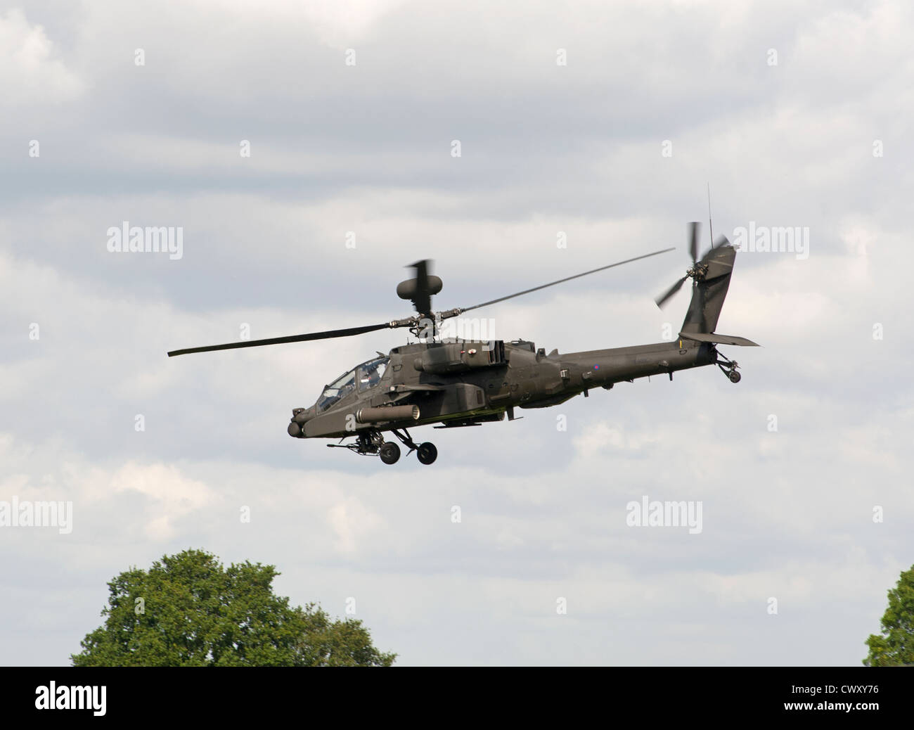 Military Army Air Corps WAH-Apache AH-64 AH Attack Helicopter flying low level.  SCO 8389 Stock Photo