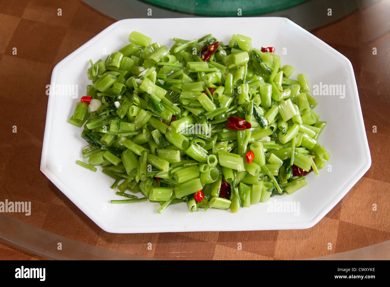 Fried Water Spinach closeup in a plate Stock Photo