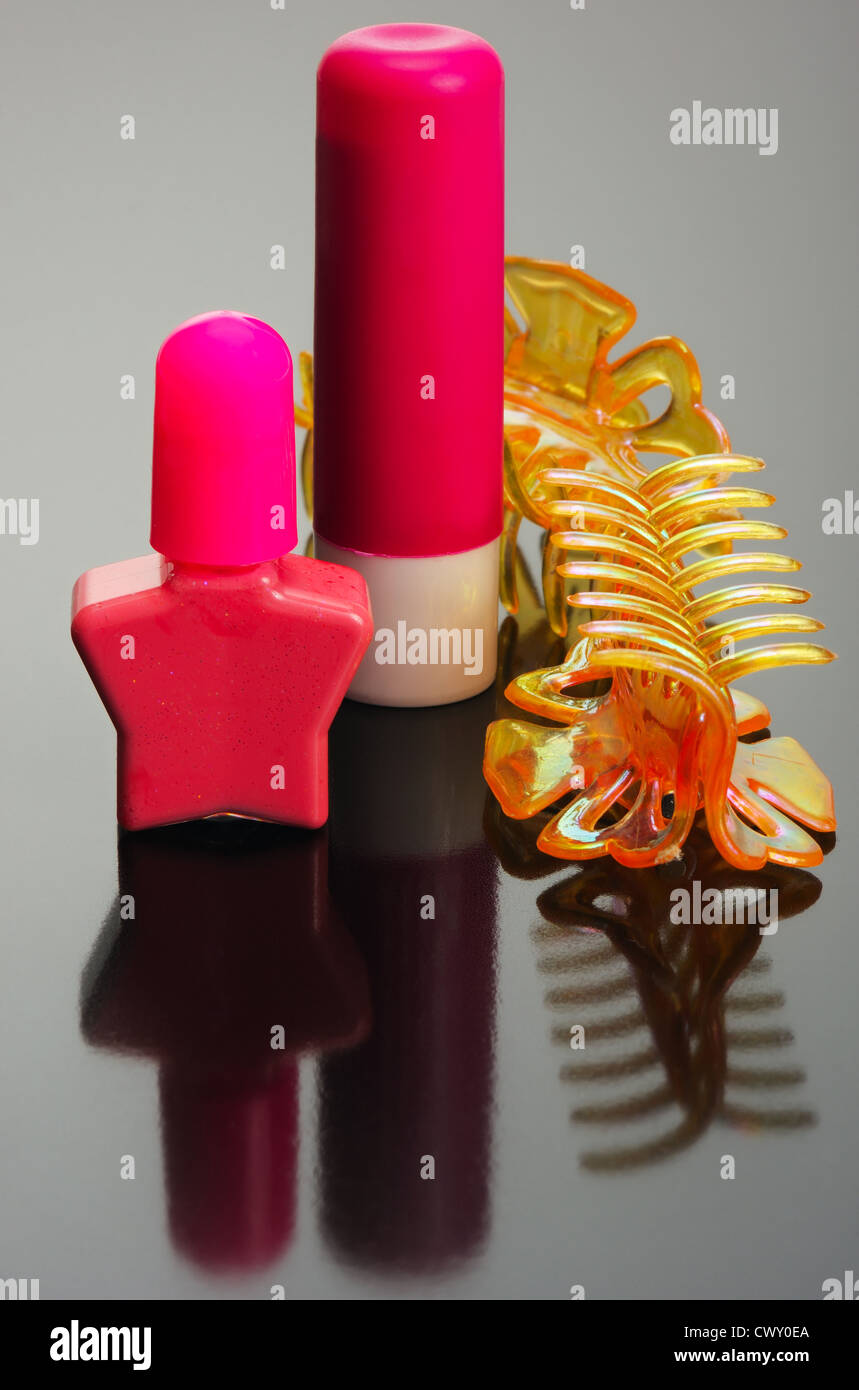 Set for girls nail polish, lipstick and hairclips Stock Photo Alamy
