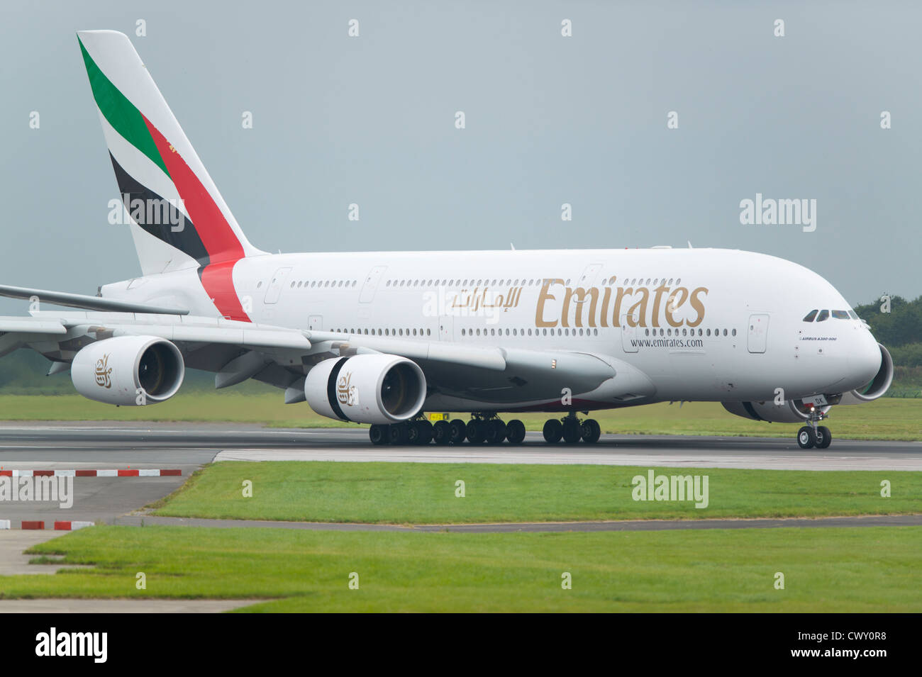 A Emirates Airbus A380 taxiing on the runway of Manchester International Airport (Editorial use only) Stock Photo
