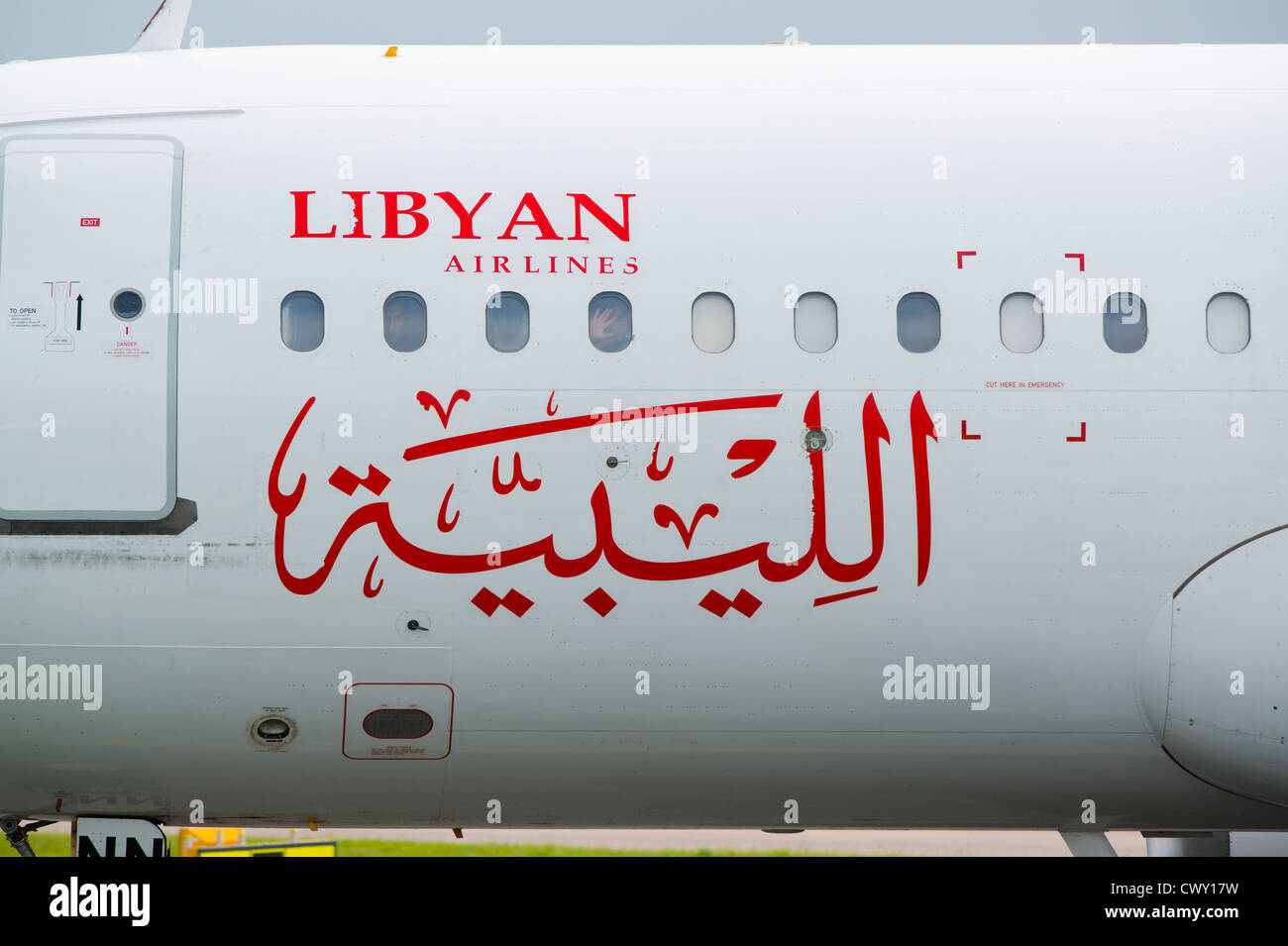 A close up of the Libyan Airlines logo on the fuselage of a passenger aircraft (Editorial use only) Stock Photo