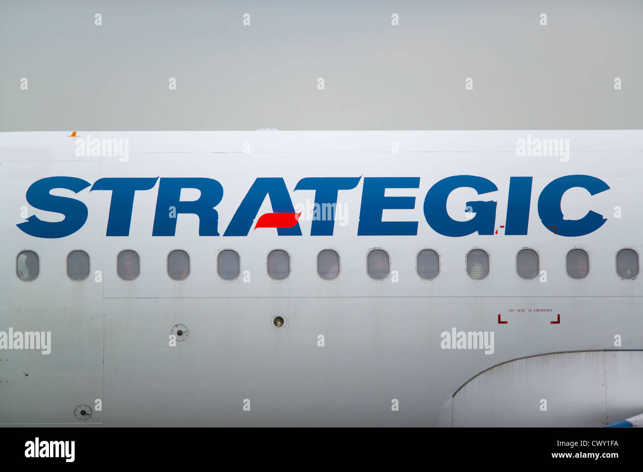 A close up of the Strategic logo on the fuselage of a passenger aircraft (Editorial use only) Stock Photo