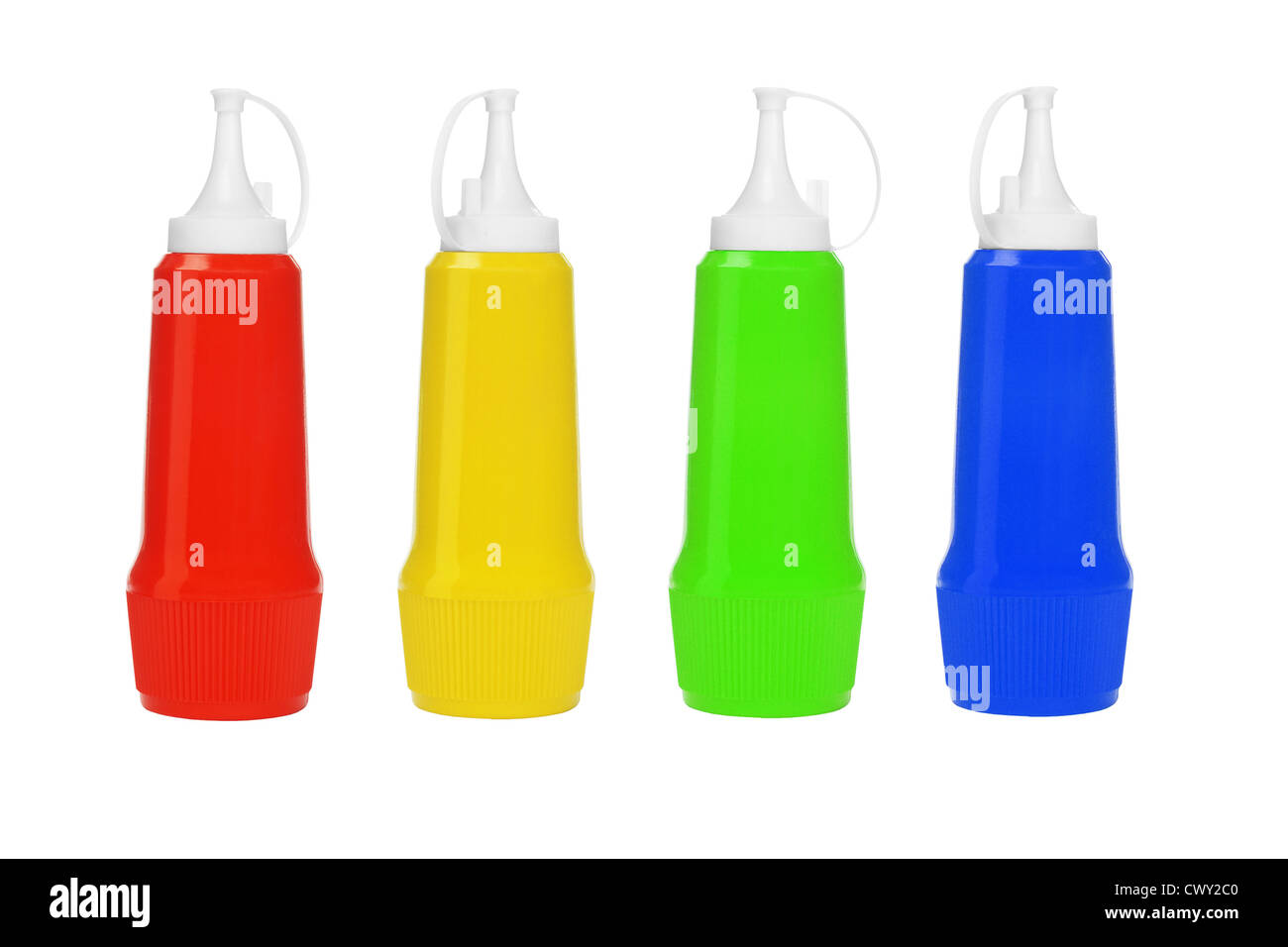 Row of Colorful Plastic Bottles of Sauces on White Background Stock Photo