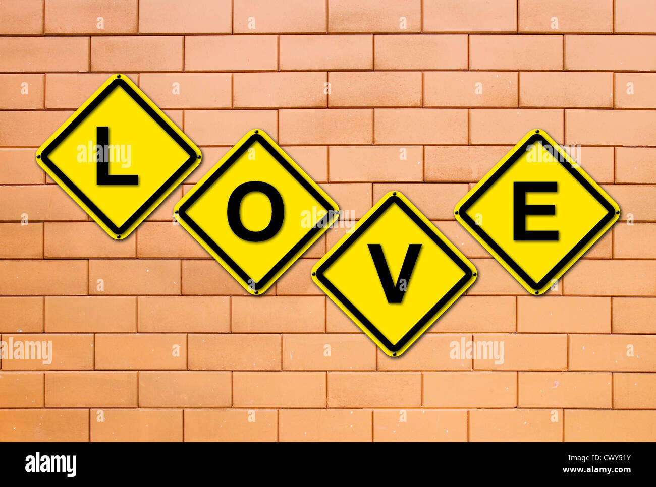 love sign on brick wall background Stock Photo - Alamy