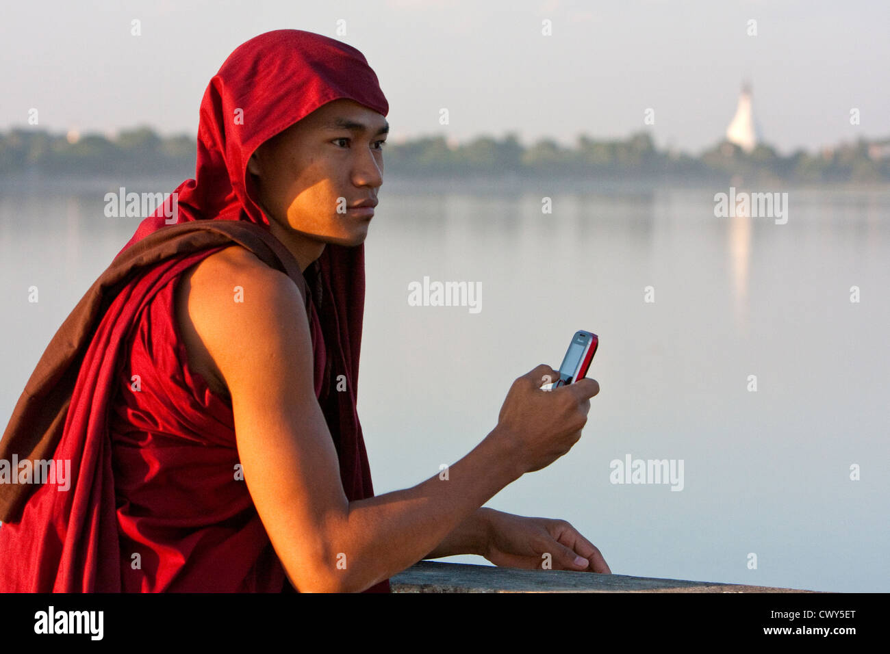 Buddhist monk phone hi-res stock photography and images - Alamy