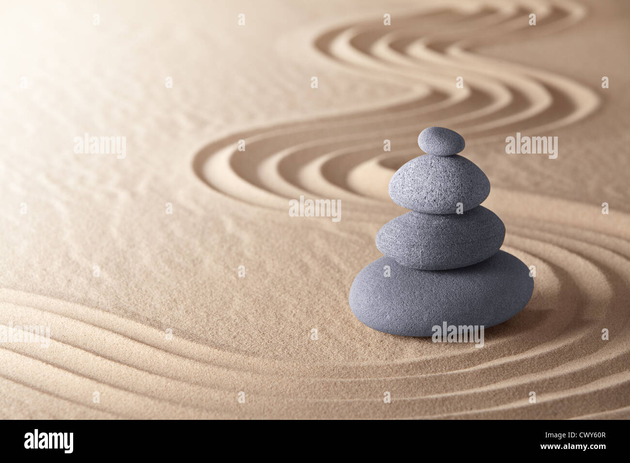 zen meditation garden japanese buddism concentration and relaxation stone and sand conceptual purity harmony and symplicity Stock Photo