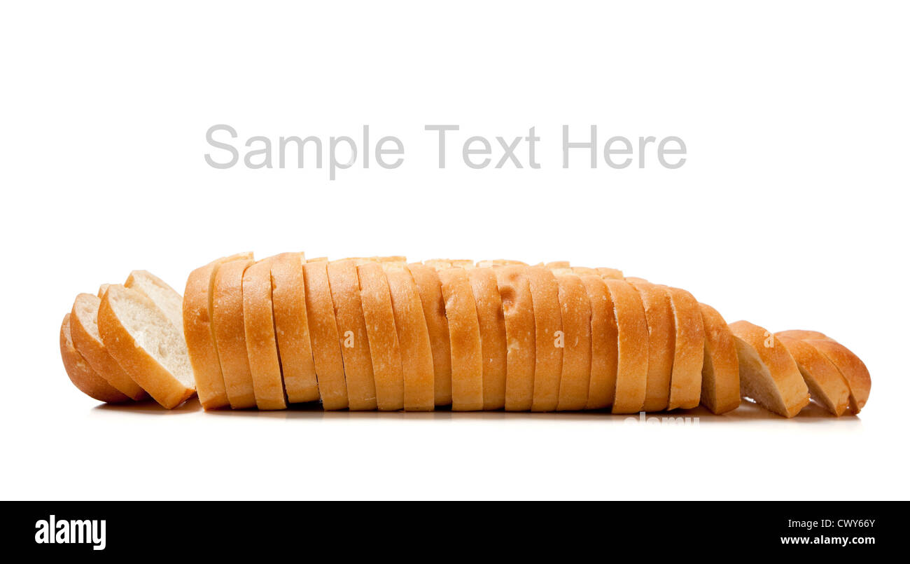 A loaf of sliced French bread on a white background with copy space ...