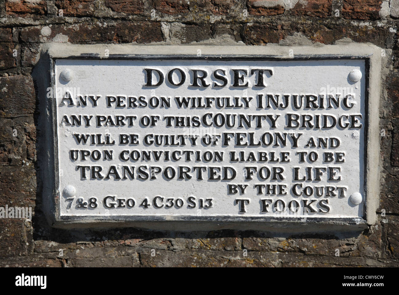 A historic warning sign on a bridge in Dorset UK Stock Photo