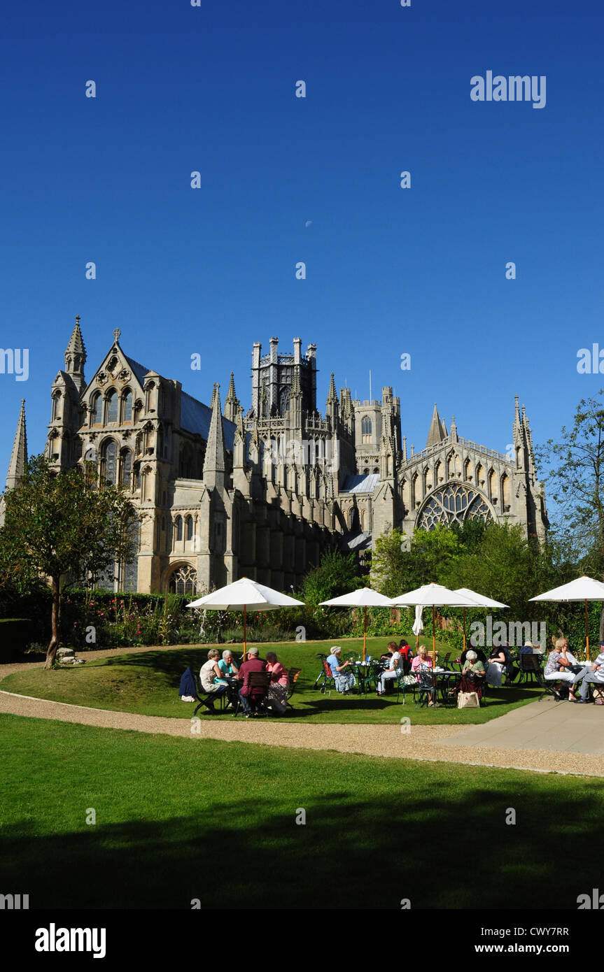 Moon over Ely Cathedral and The Almonry restaurant gardens, Ely, Cambridgeshire, England, UK Stock Photo