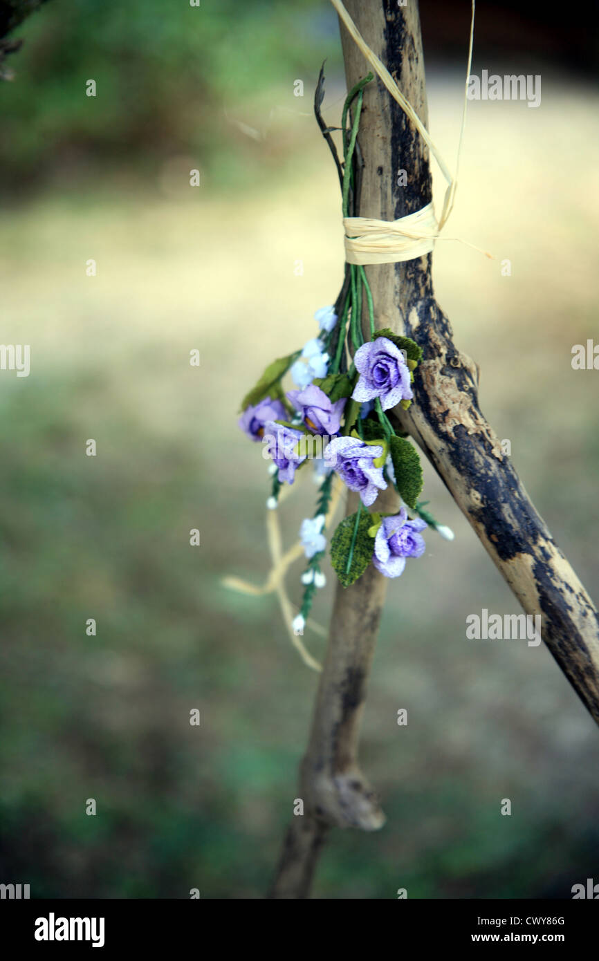 Posy of flowers tied to a branch for a wedding in France Stock Photo