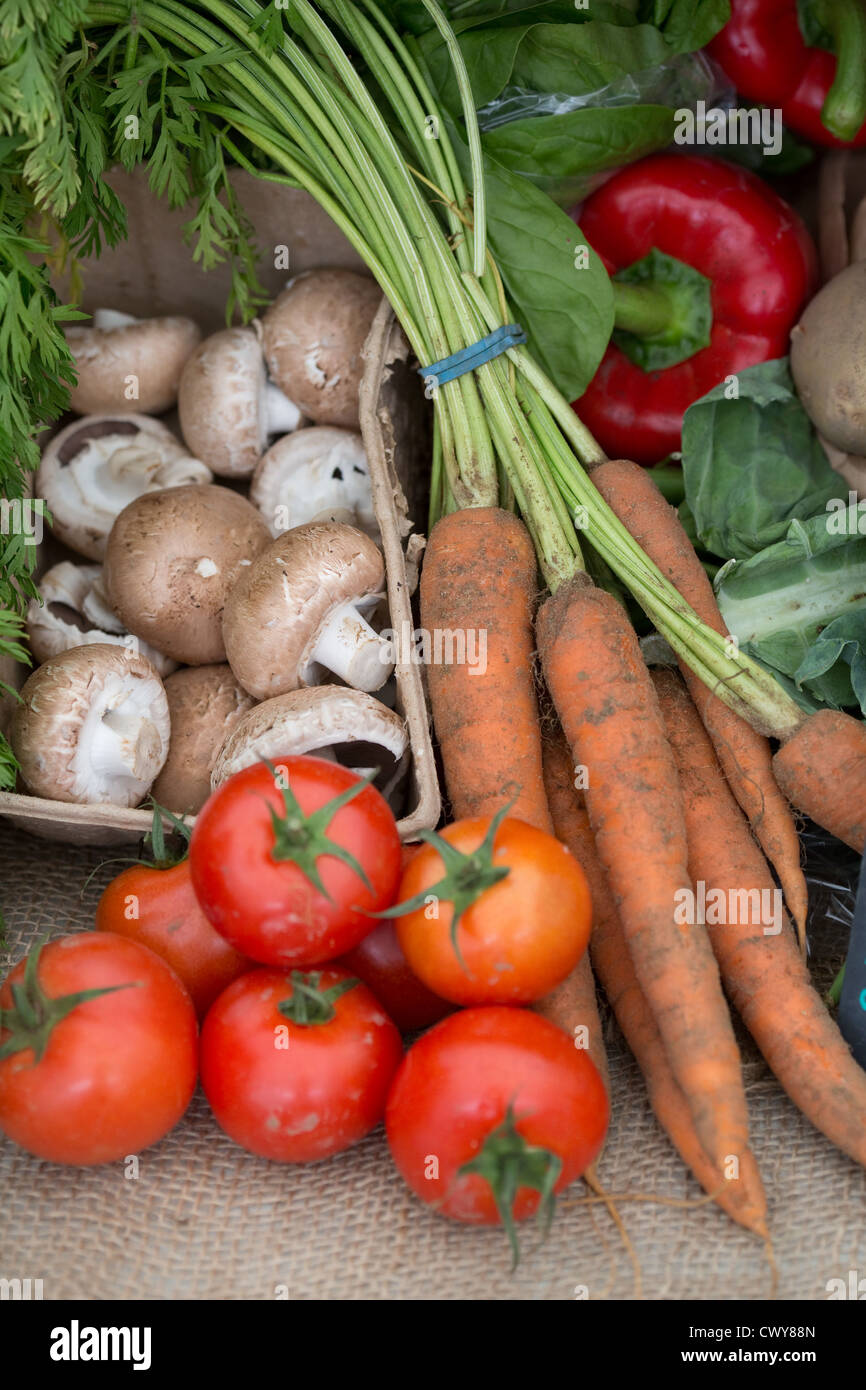 Organic produce on a market stall Stock Photo - Alamy