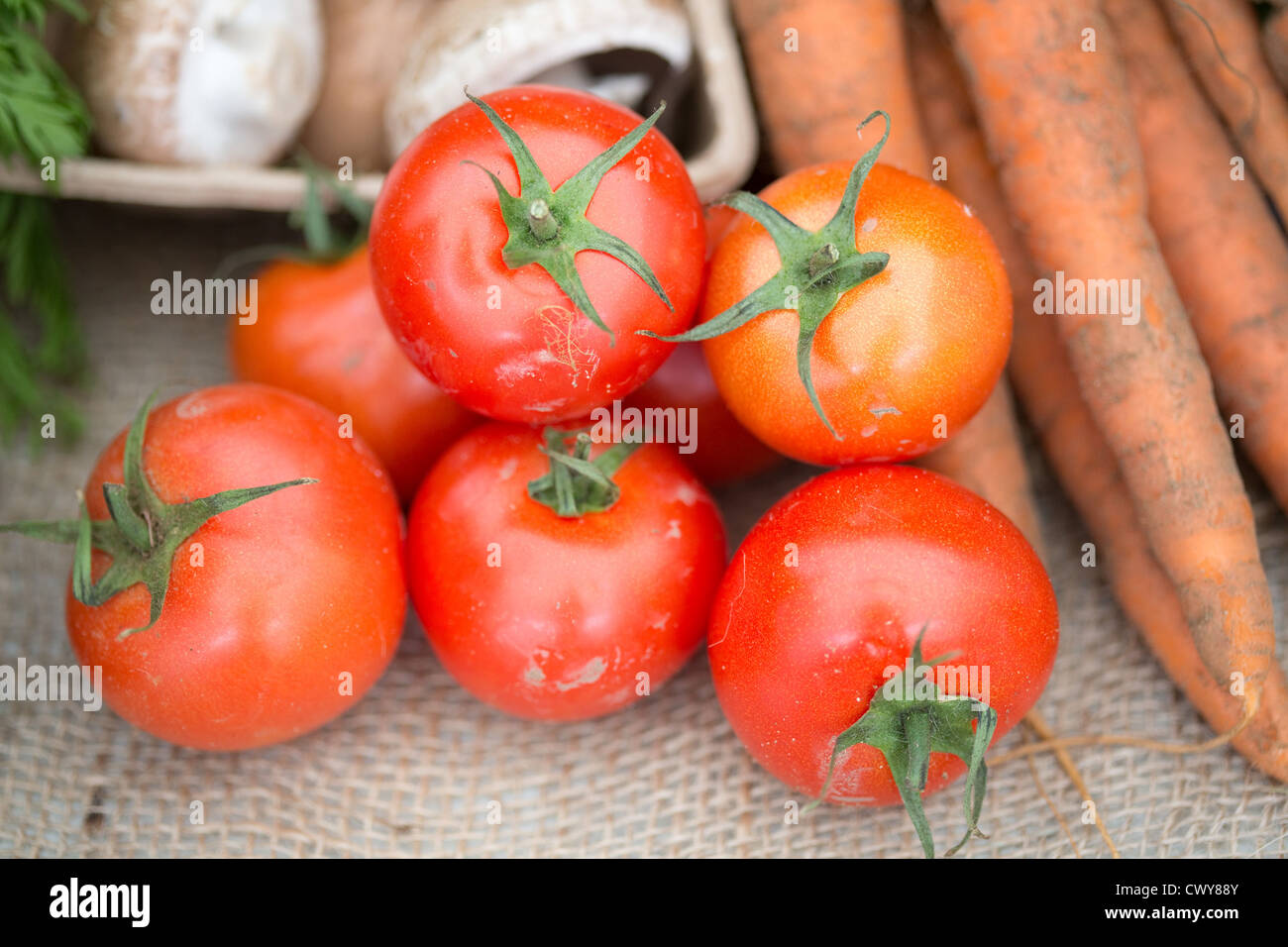 Organic Tomatoes on a market stall Stock Photo - Alamy