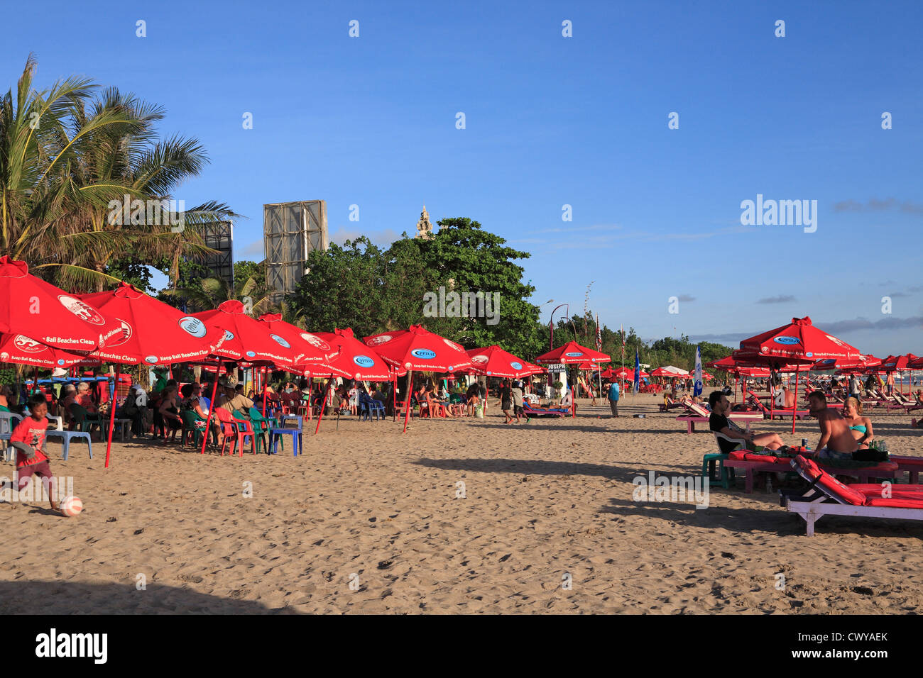 Tourists Relaxing On Sun Lounges Kuta Legian Beach Bali Indonesia