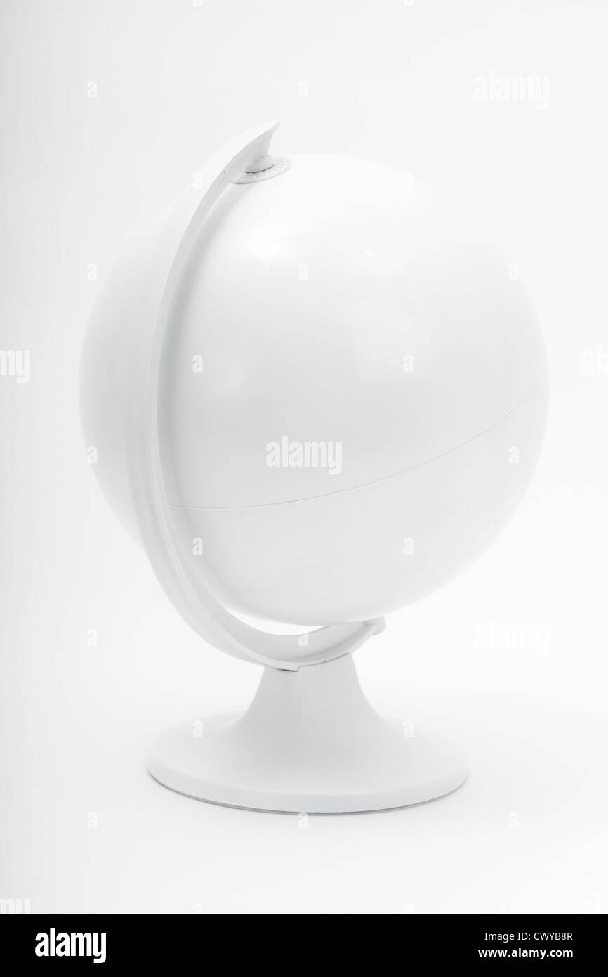 All white world globe on a stand shot in studio Stock Photo - Alamy