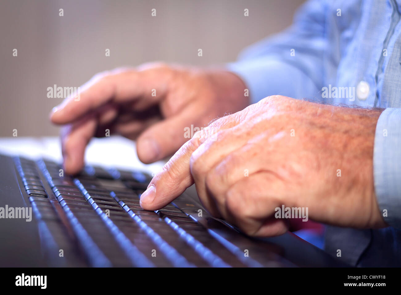 Office job. Businessman typing on a Computer Keyboard. Stock Photo