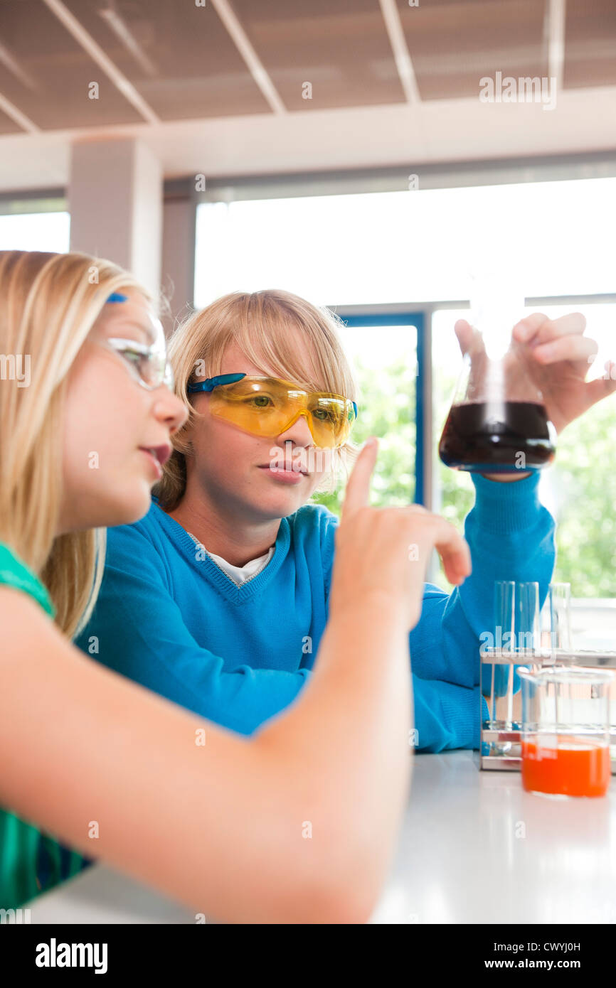 Two teenager chemistry lab hi-res stock photography and images - Alamy