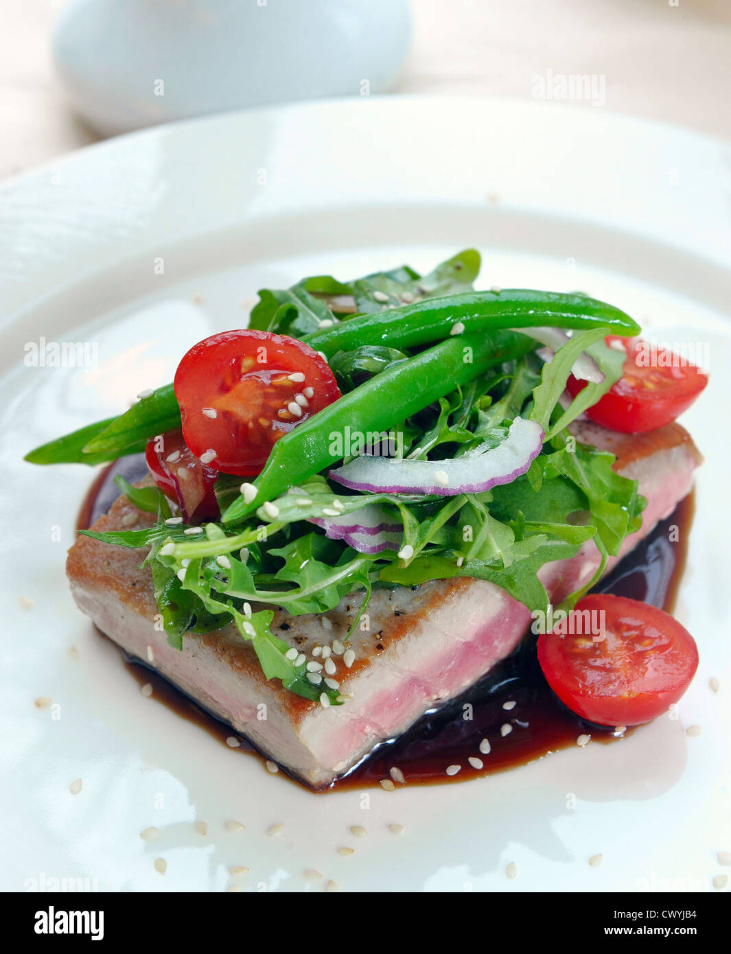 grilled tuna with vegetables and sauce Stock Photo Alamy