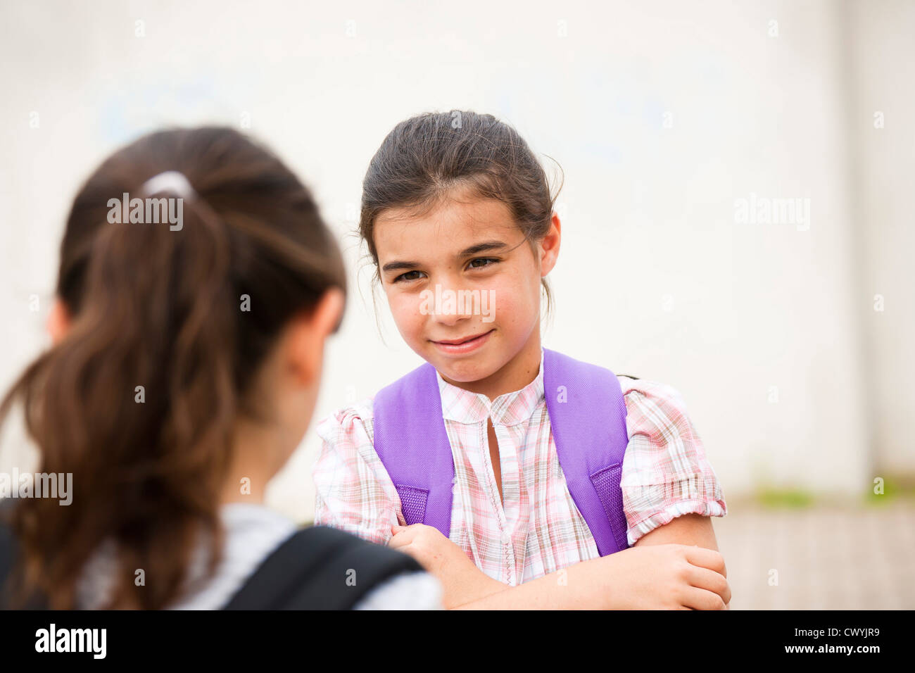 Two girls looking at each other Stock Photo