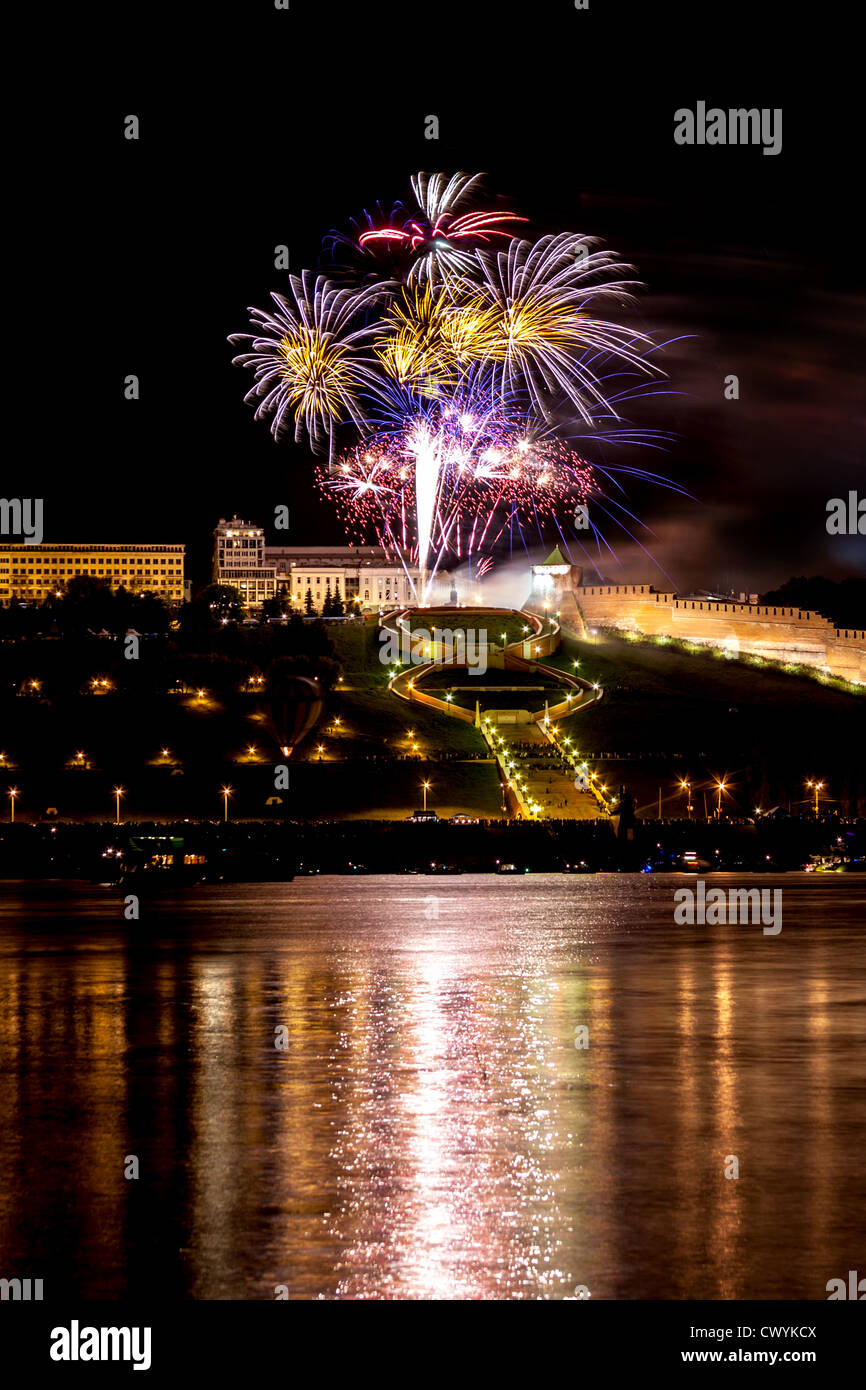 Colorful Fireworks over river Stock Photo