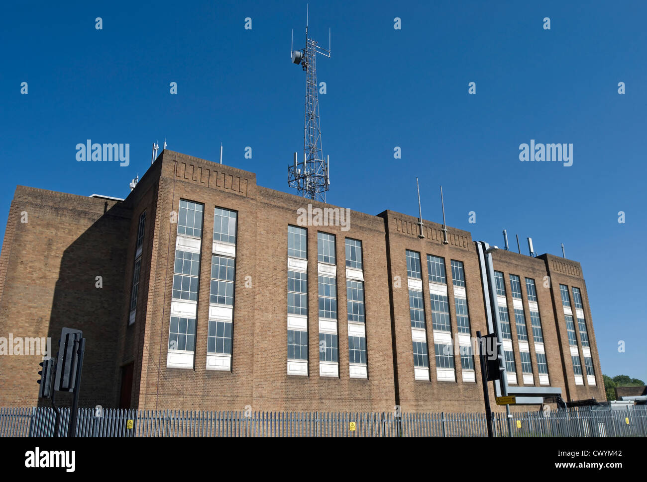 electricity substation with mobile phone mast on roof, hayes, middlesex, england Stock Photo