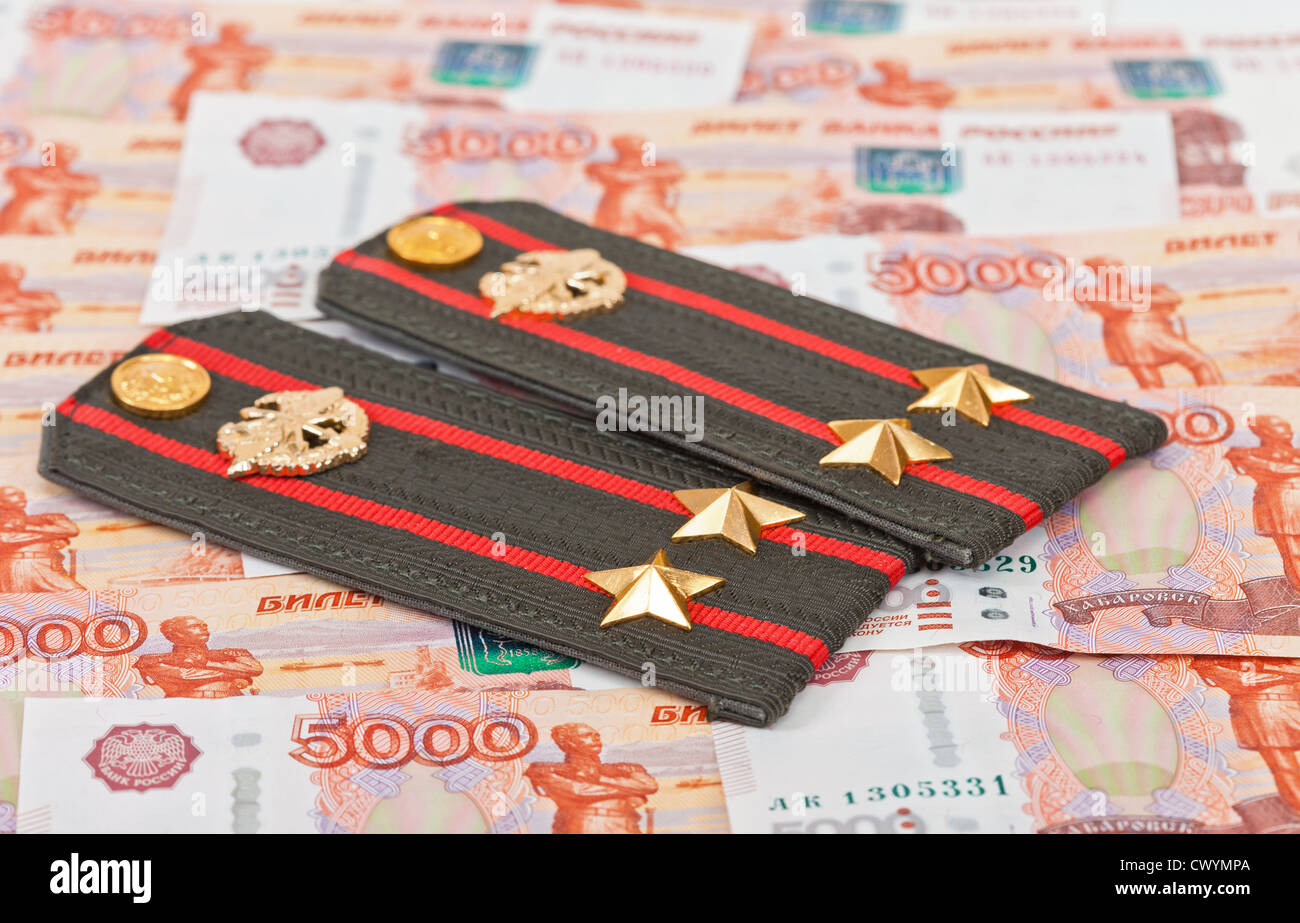 Shoulder strap of russian army on money background Stock Photo