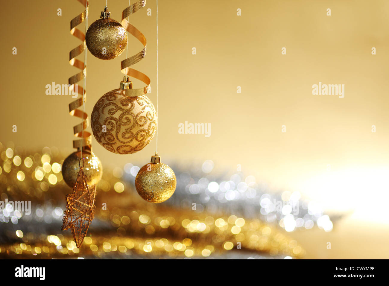 golden christmas balls on bokeh background Stock Photo - Alamy