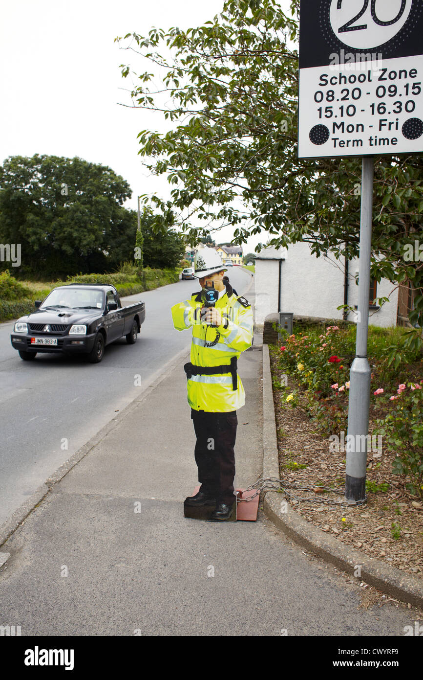 PC flat - a life size policeman cut out with laser gun used in Isle of Man to stop speeding Stock Photo
