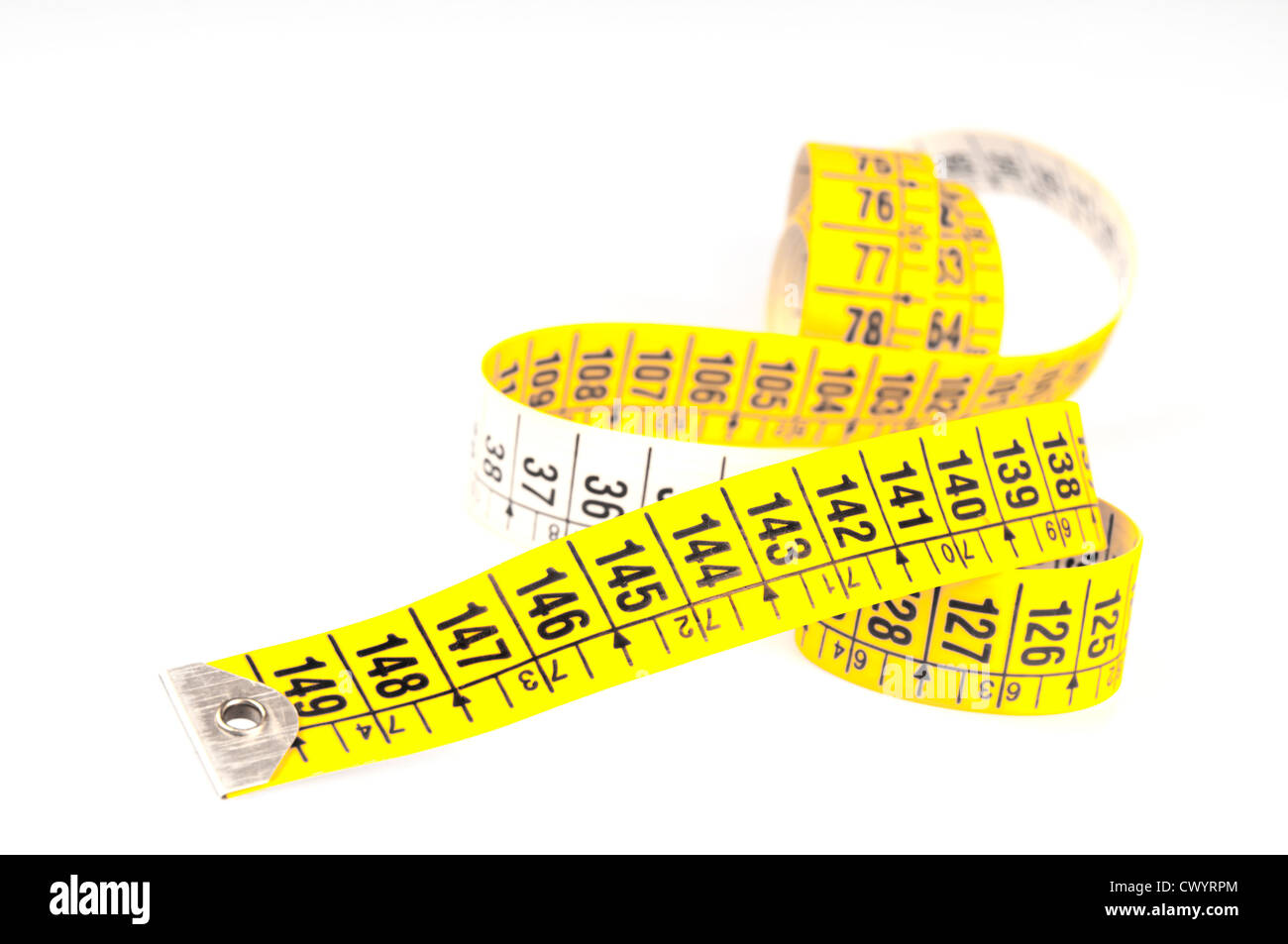 Tailors tape measure cut out against a white background. Yellow