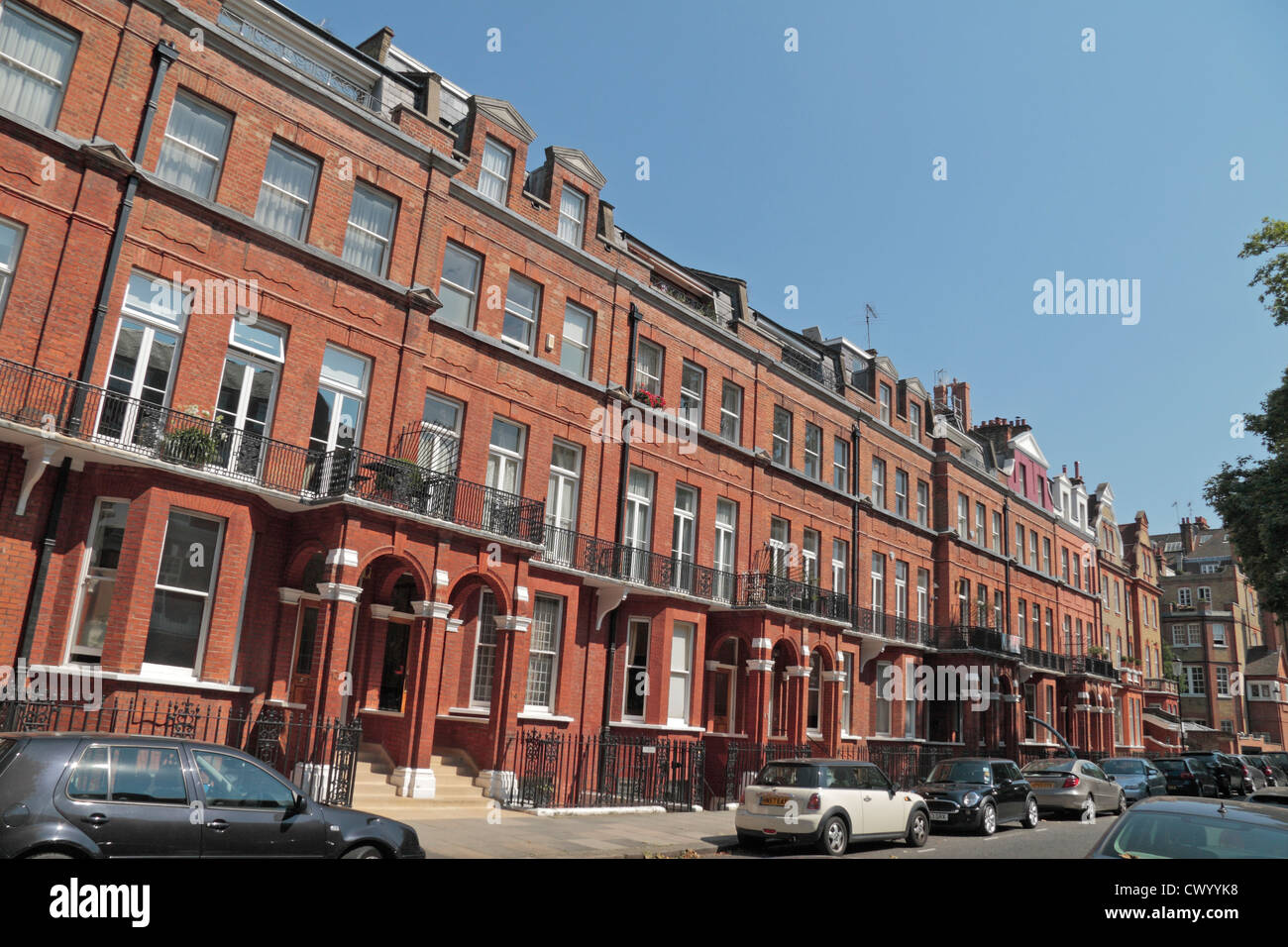 Red brick houses on Cheyne Gardens, Chelsea, London, SW3, UK Stock