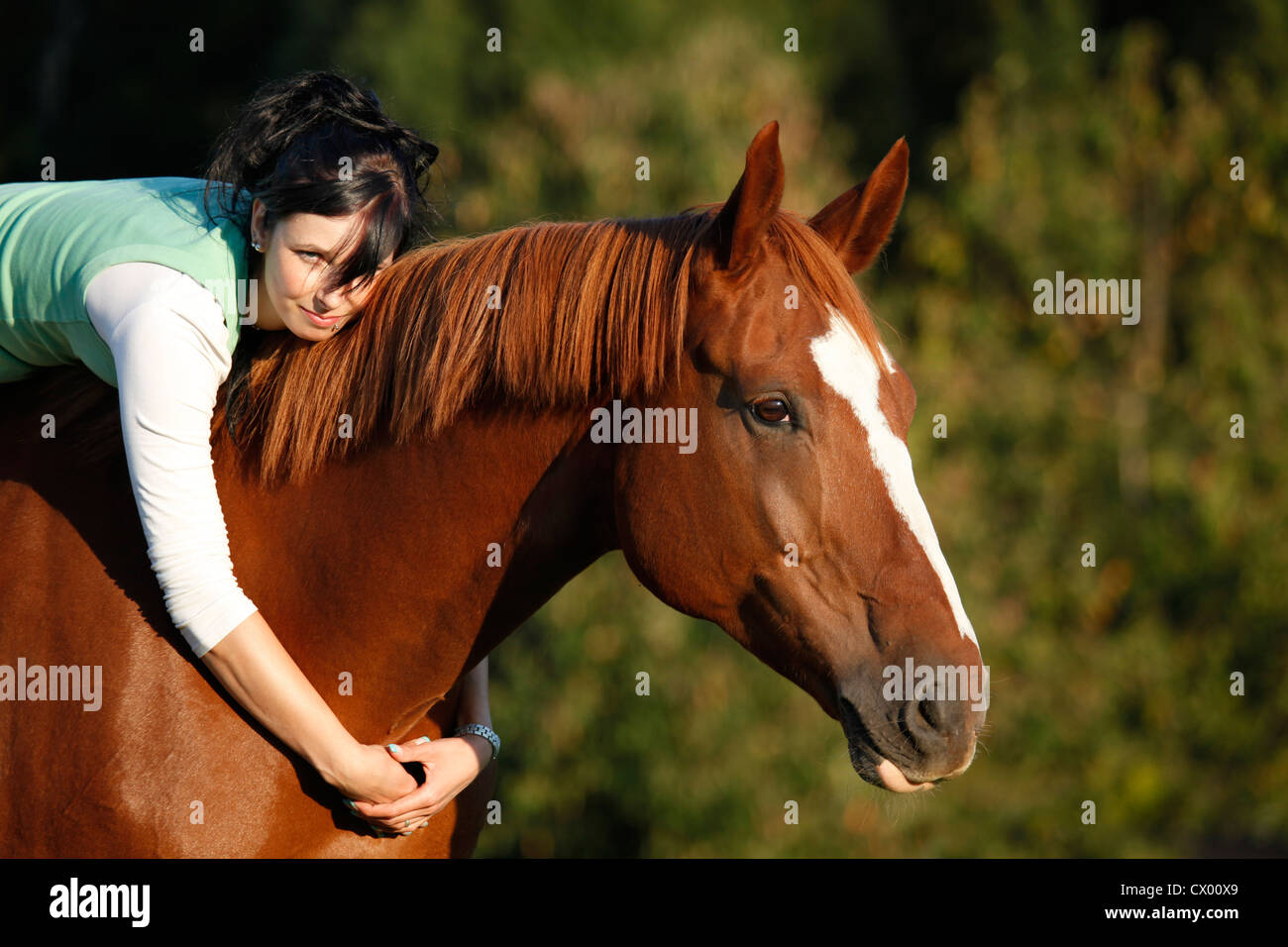 young woman with mare Stock Photo Alamy