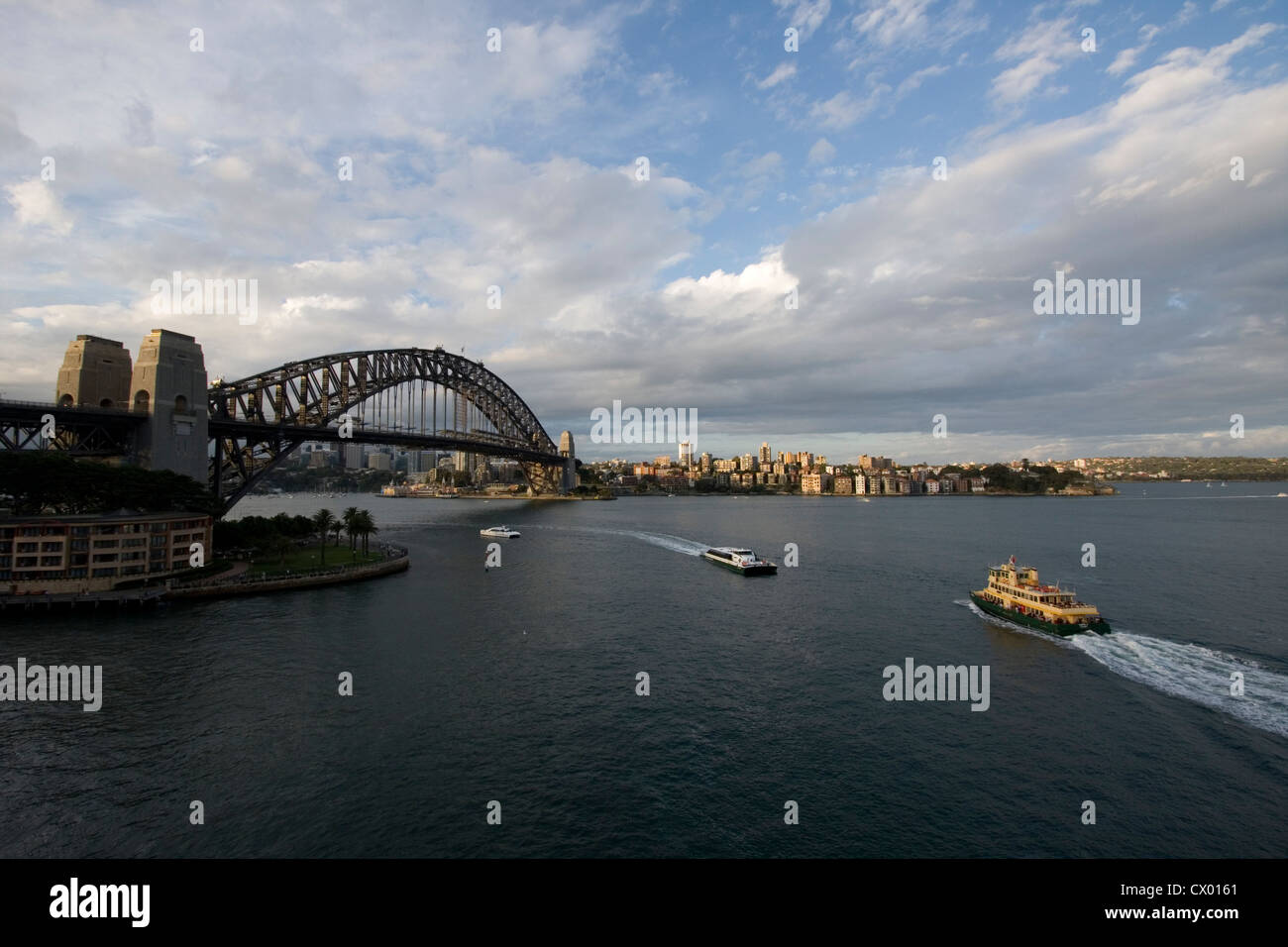 Ferry heading towards Sydney Harbour Bridge, Sydney, New South Wales, Australia Stock Photo