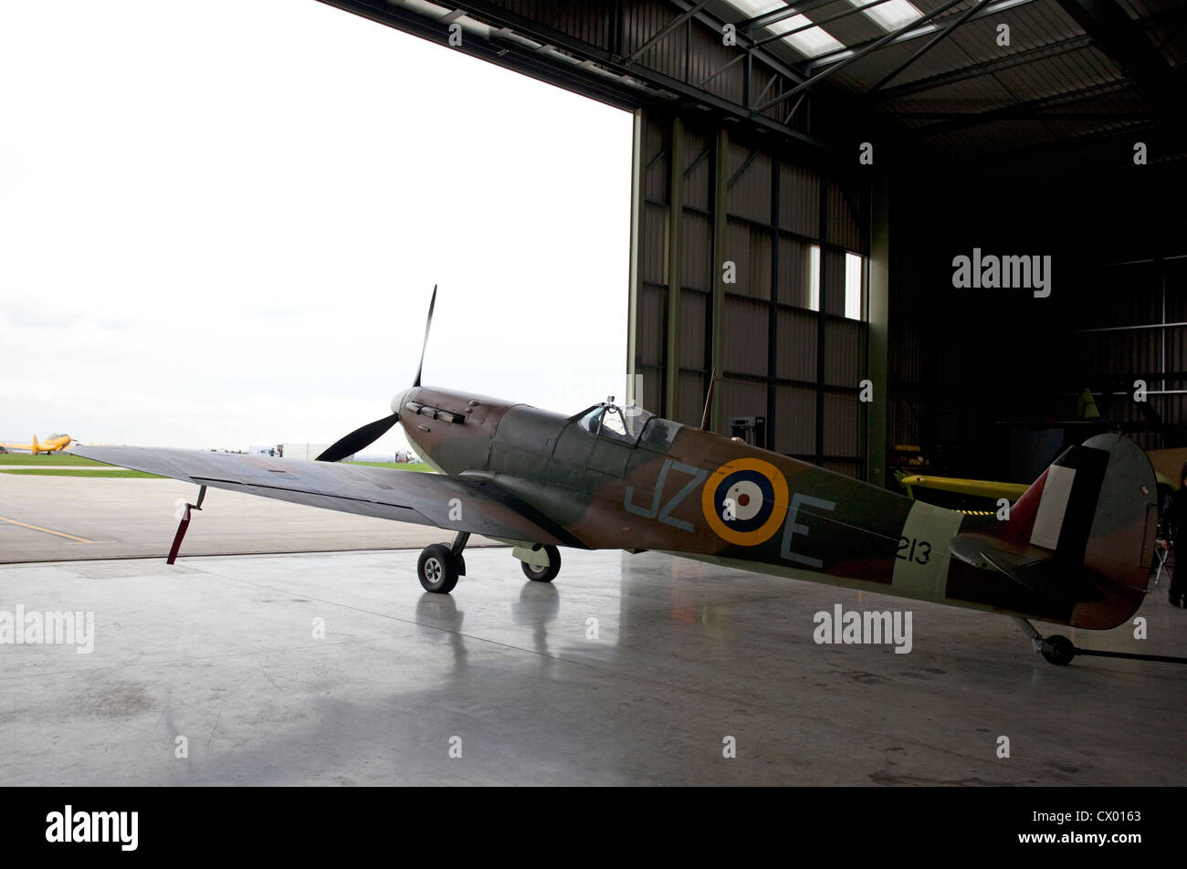 supermarine spitfire in aircraft hanger at kemble airfield Stock Photo