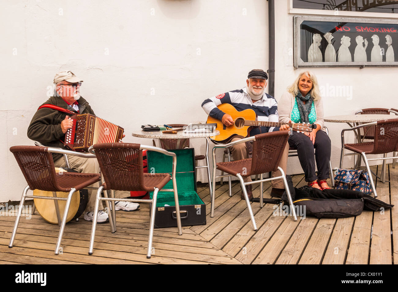 Elderly people busking on the pier at Southwold , Suffolk , England , Britain , Uk Stock Photo