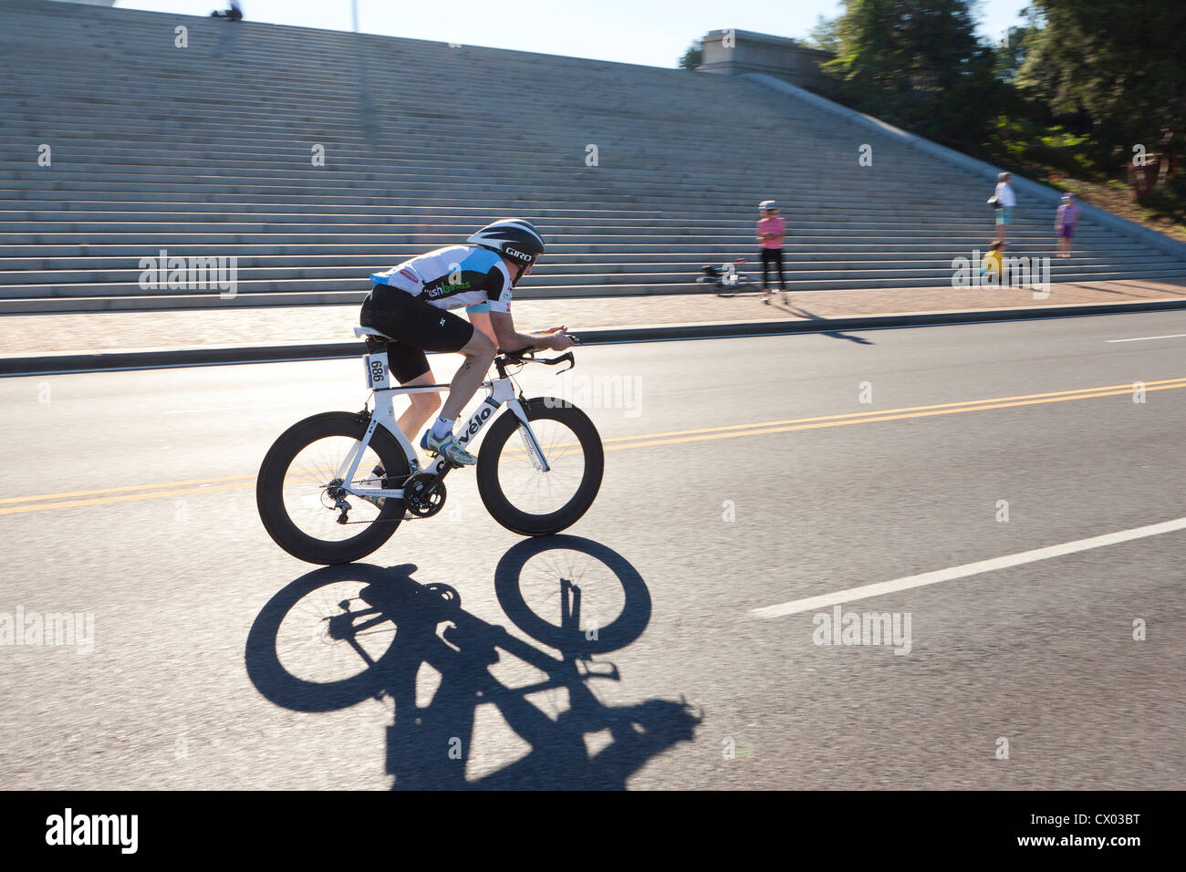 Cyclist racing on road - USA Stock Photo