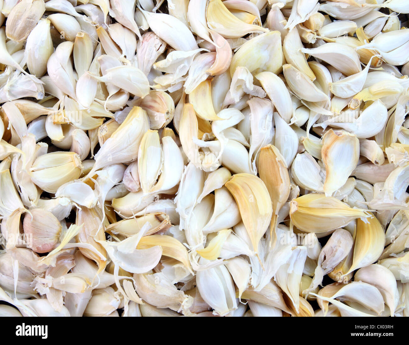 cloves of garlic, background Stock Photo - Alamy