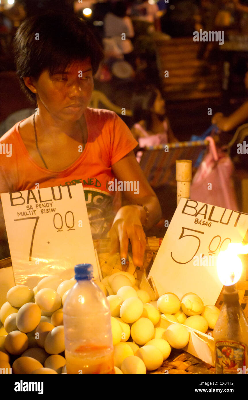 balut vendor at night, photo is taken at philippines. Stock Photo