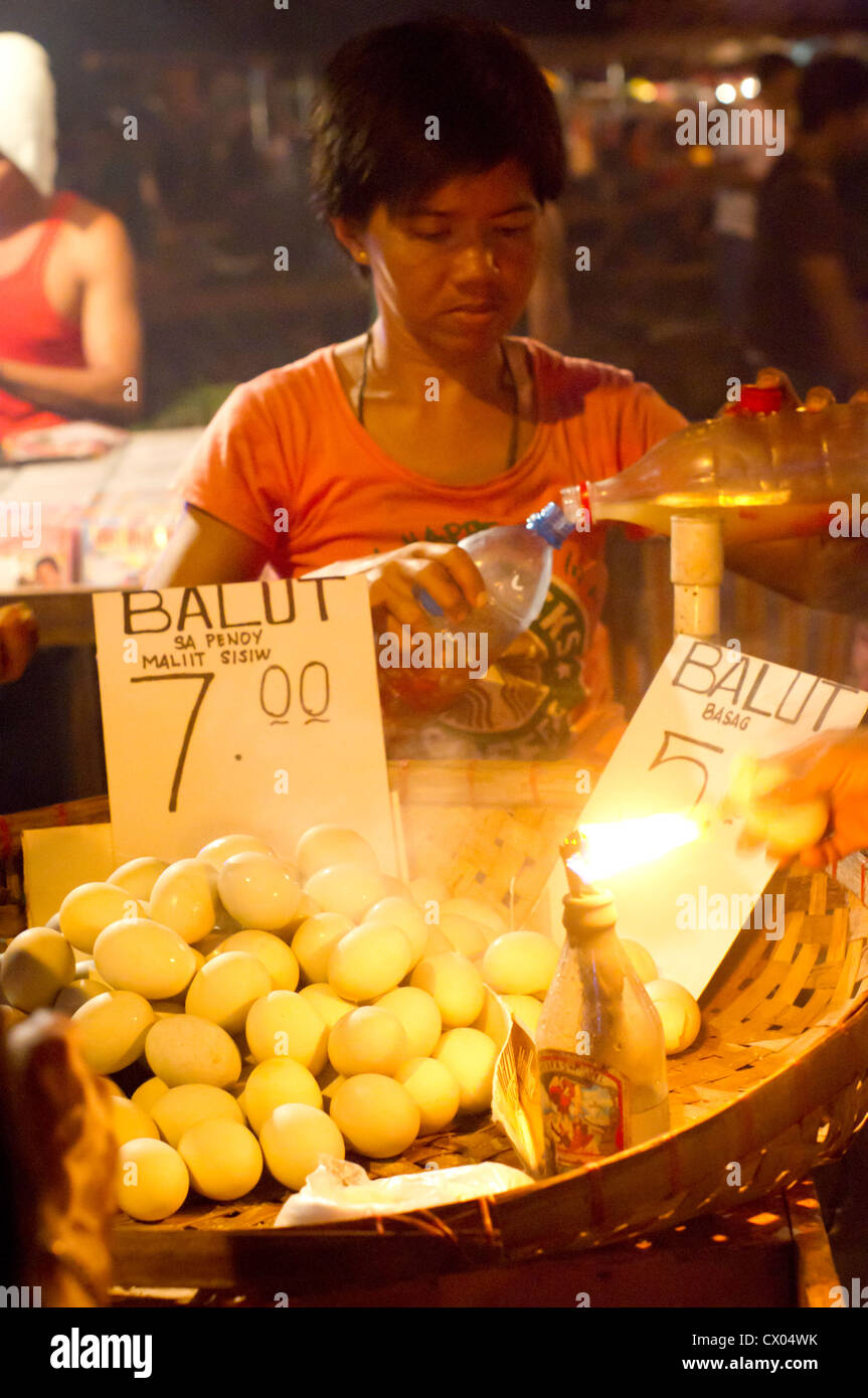 balut vendor at night, photo is taken at philippines. Stock Photo