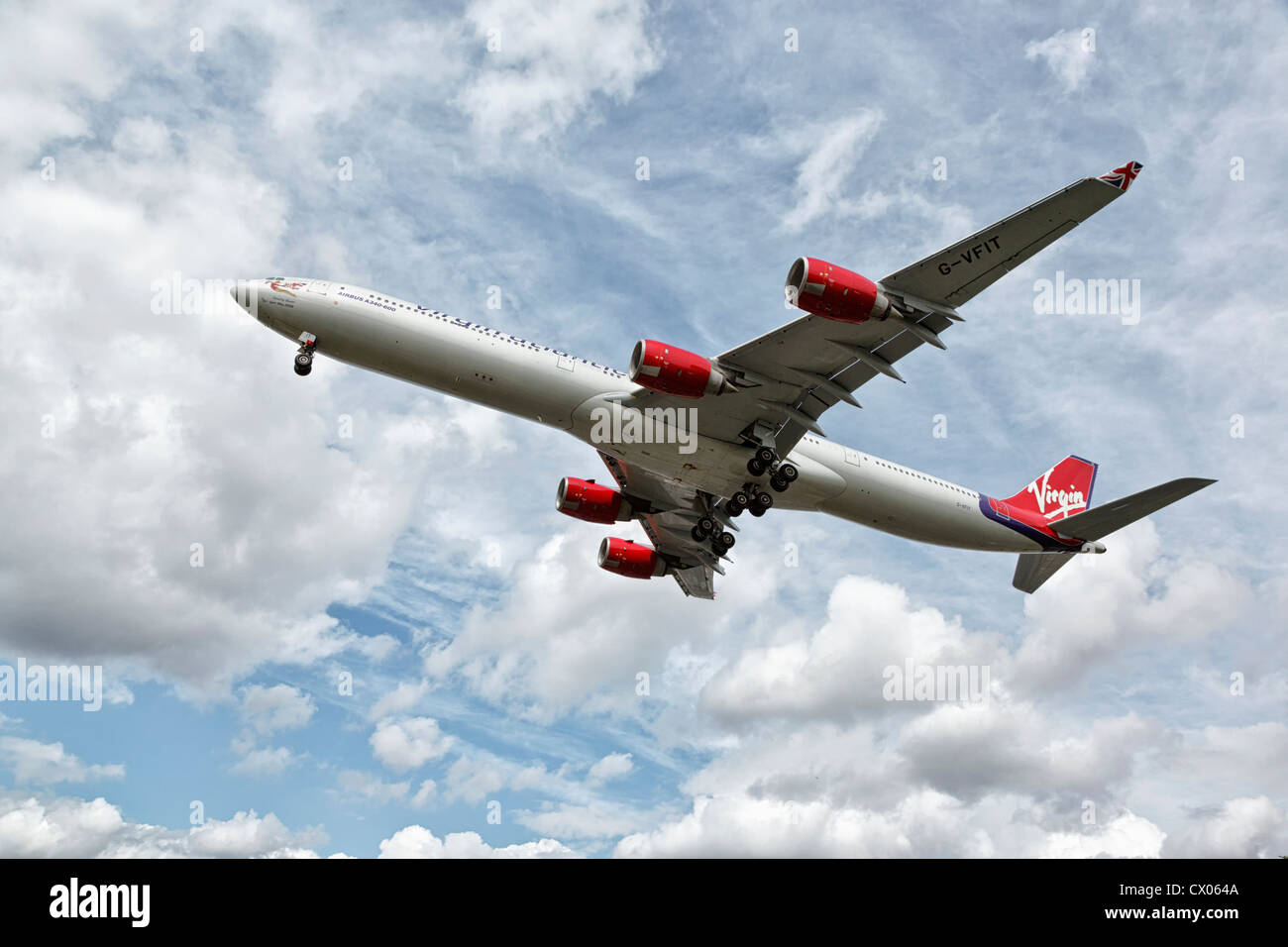 An Airbus A340 of Virgin Atlantic airlines on final approach Stock Photo