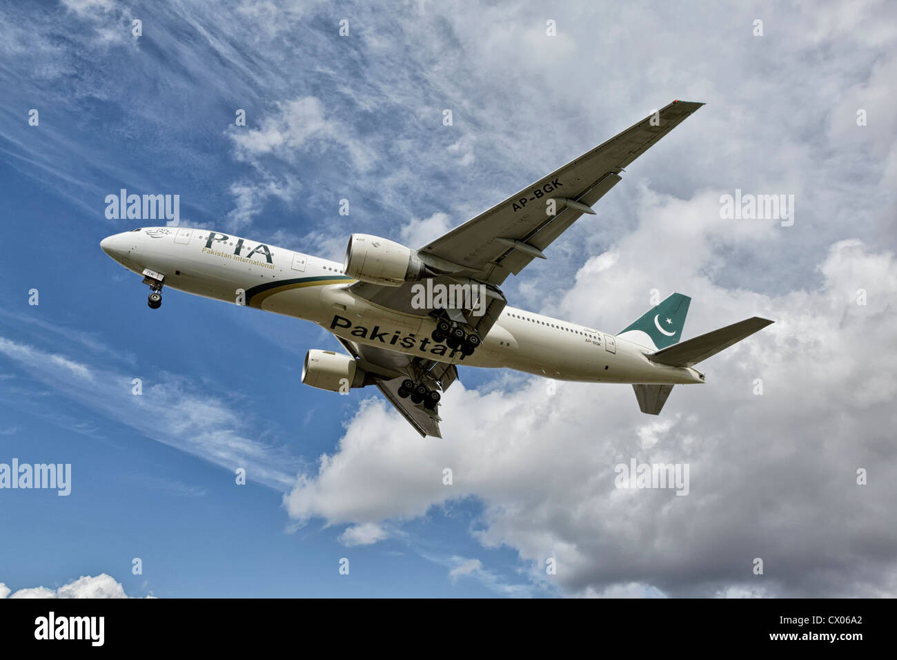 A Boeing 777 of PIA - Pakistan International Airways on final approach Stock Photo