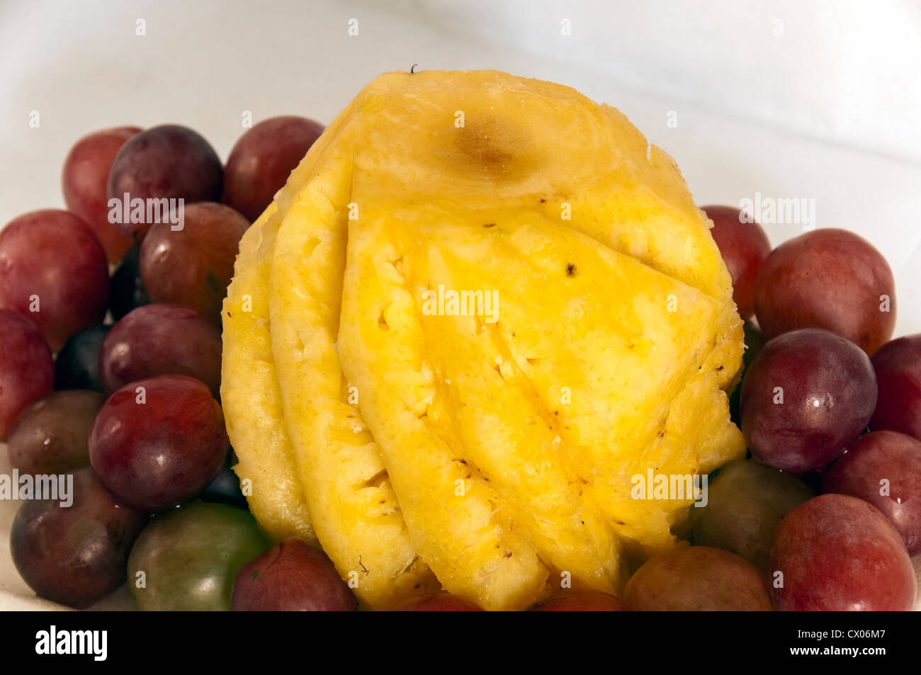 pineapple and grapes Stock Photo