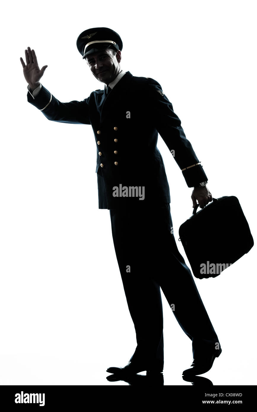 one caucasian man in airline pilot uniform in studio isolated on white background Stock Photo