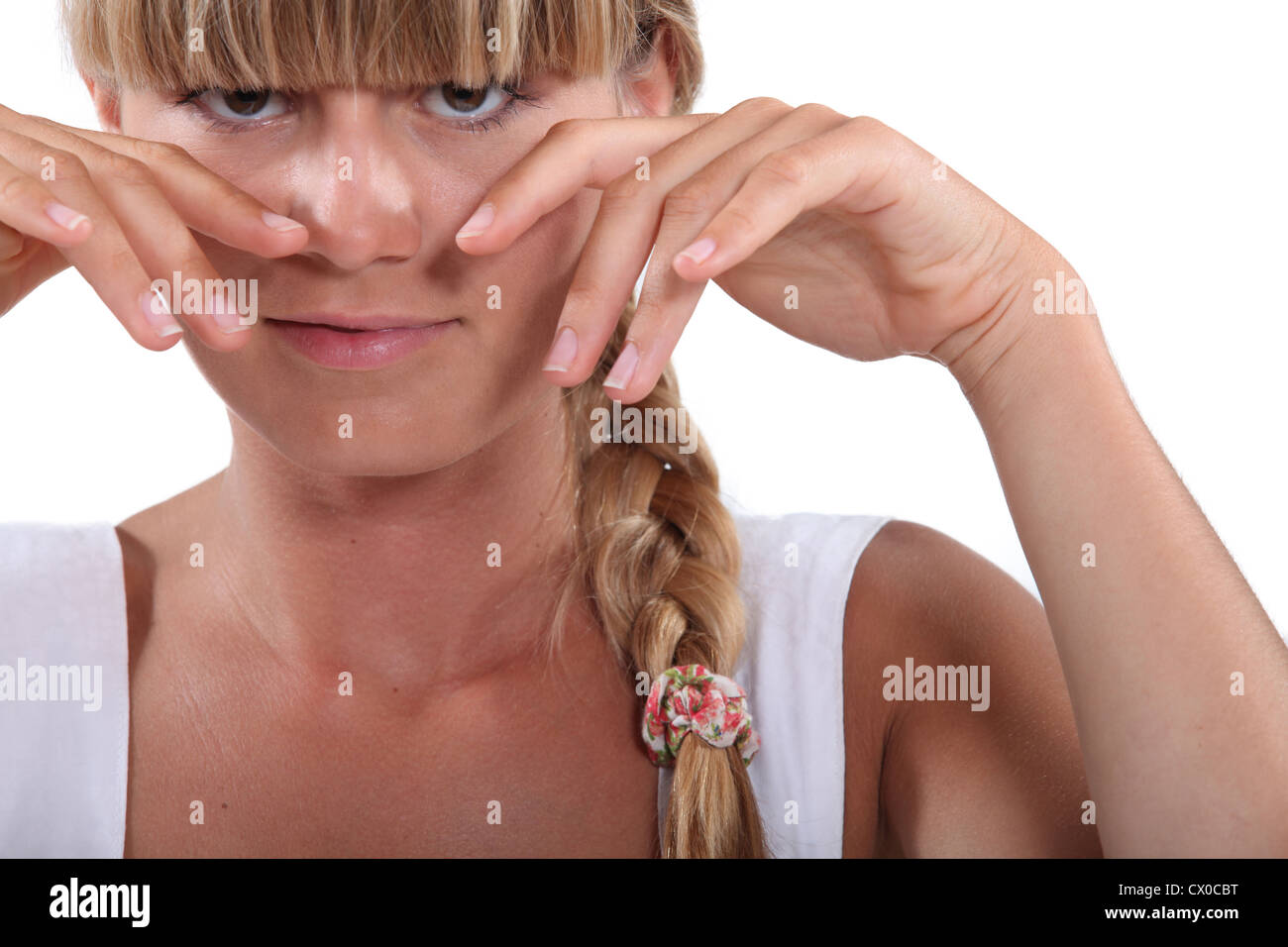 Blond woman with braid and fringe Stock Photo